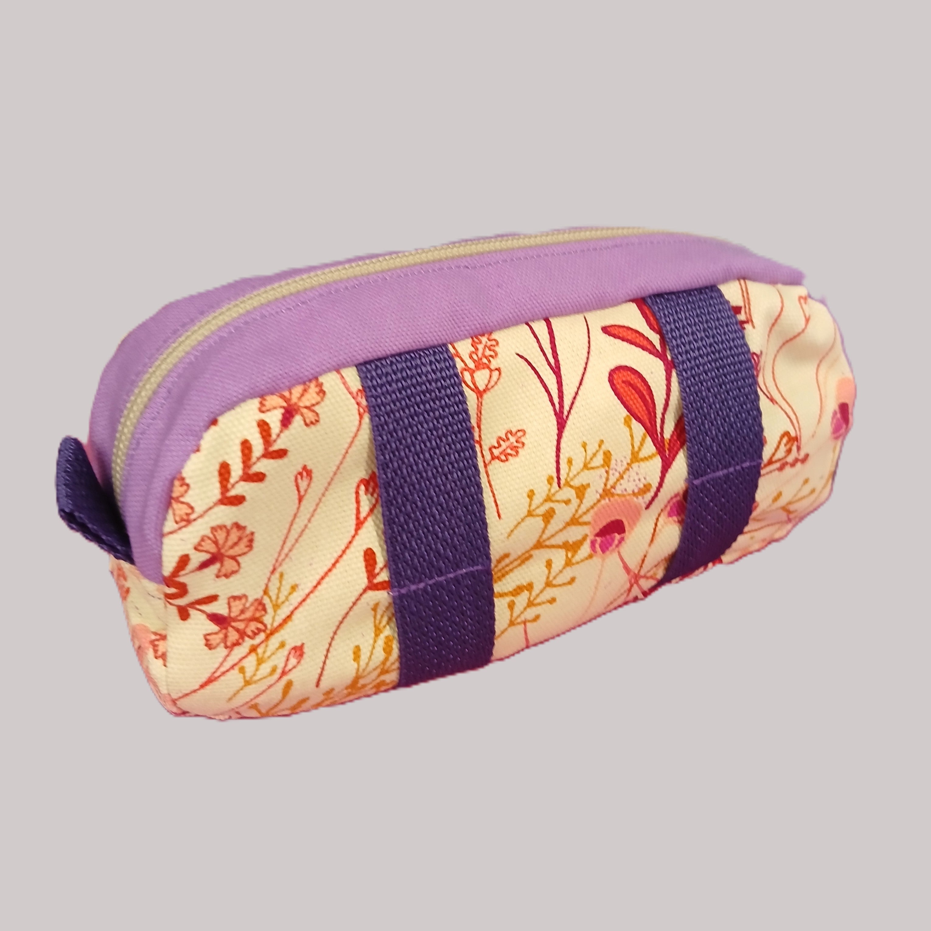 purple and floral print dopp kit with purple webbing