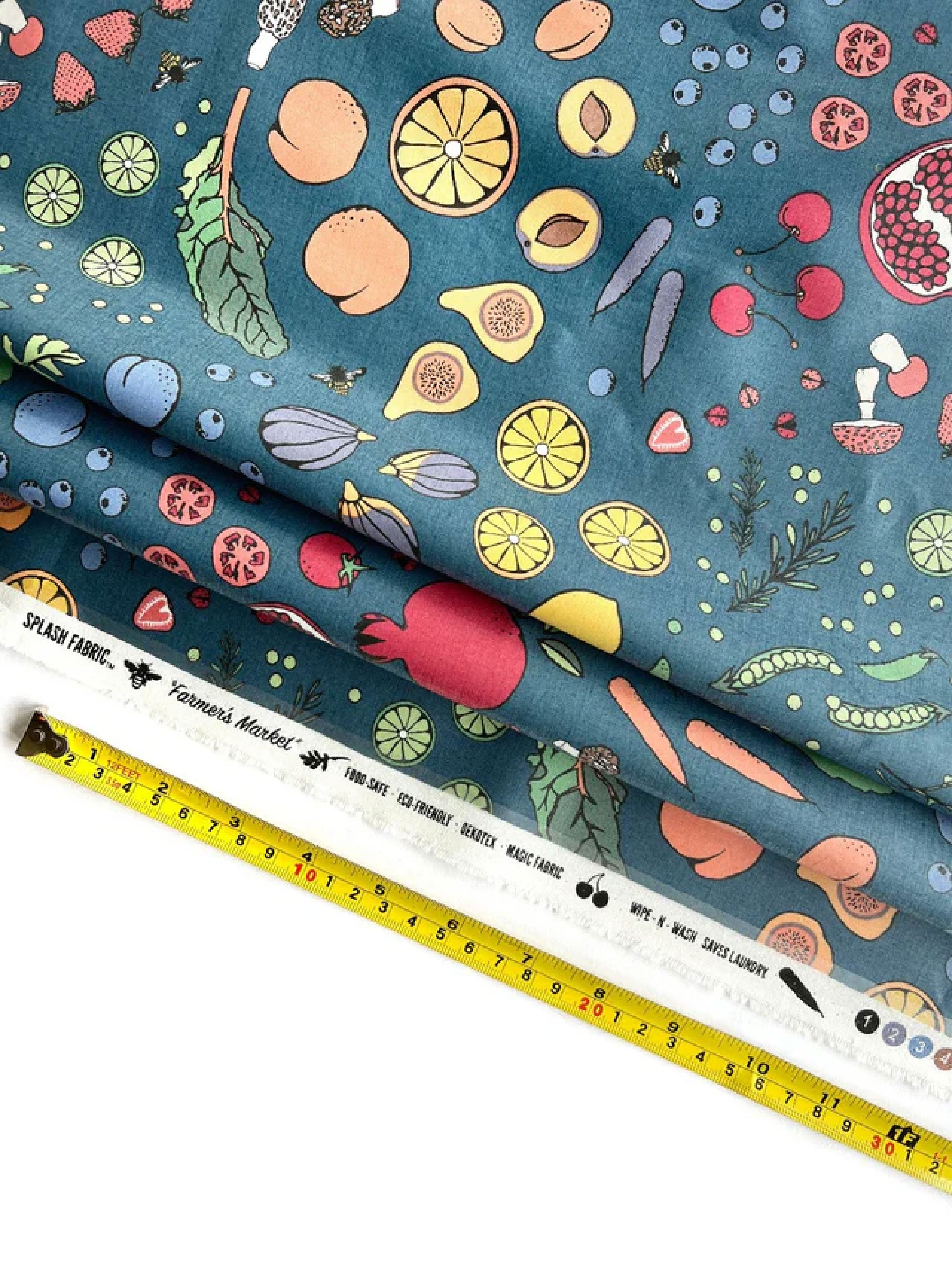 vegetable print teal laminated cotton fabric