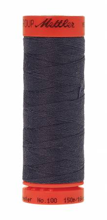 A spool of Mettler sewing thread, featuring dark navy blue thread wound around a spool with a bright orange-red top and bottom cap. The brand 'Mettler' is clearly printed on the top cap.