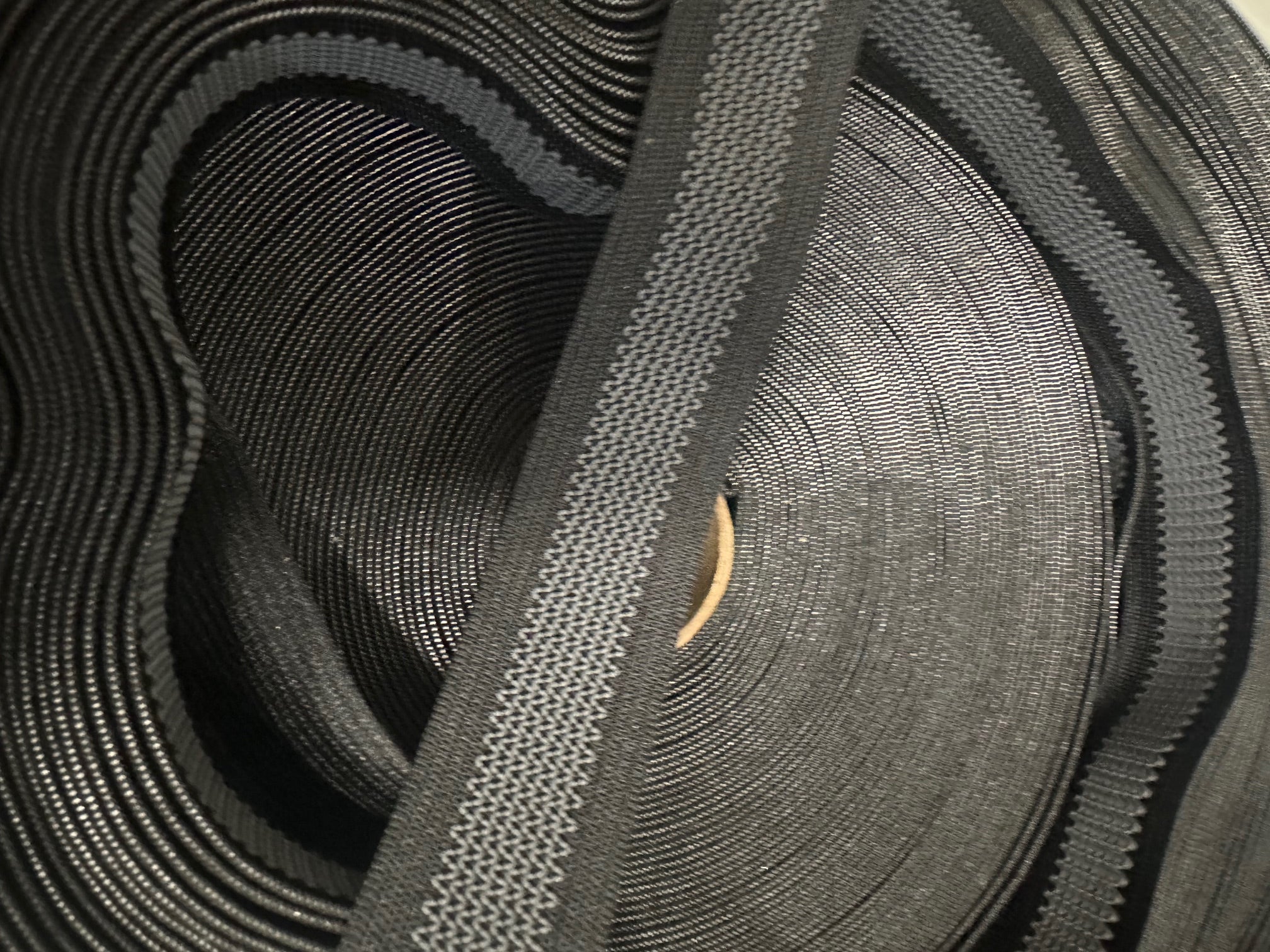 close up of black grip elastic roll