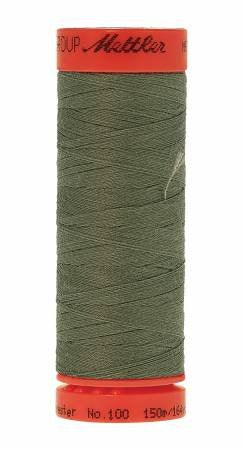 A spool of Mettler sewing thread in olive green, featuring a bright orange-red top and bottom spool end with black printed branding.