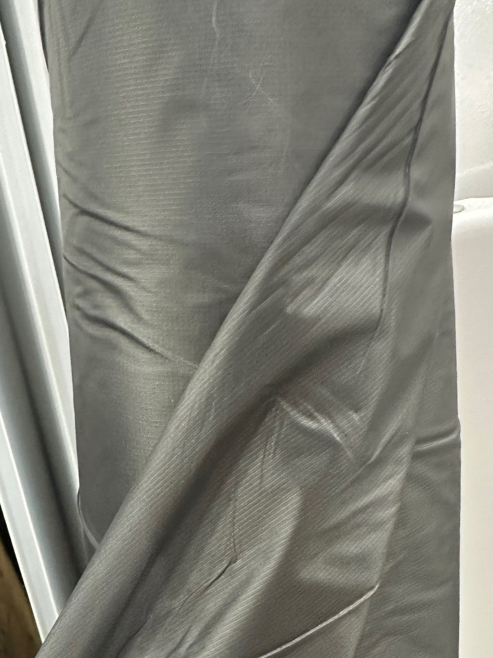 Close-up of gray fabric with a textured pattern