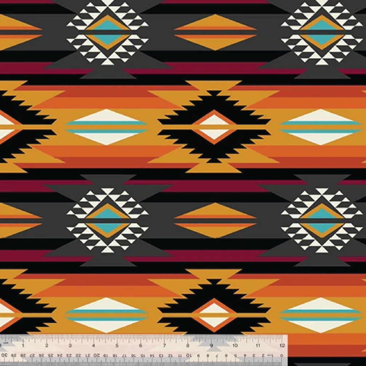 This fleece has a beautiful orange Southwestern print with accents of teal, grey, black and white.
