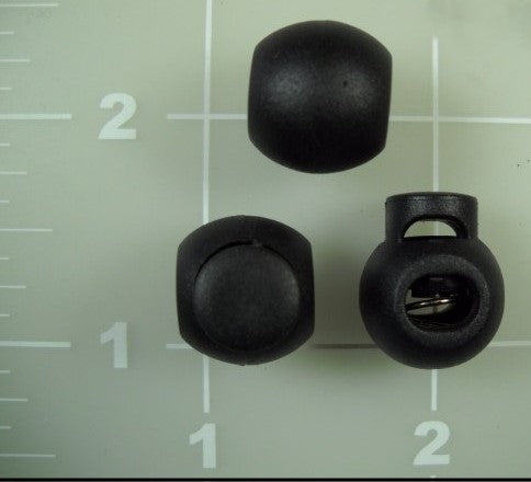three toggle ball locks on a measuring board.