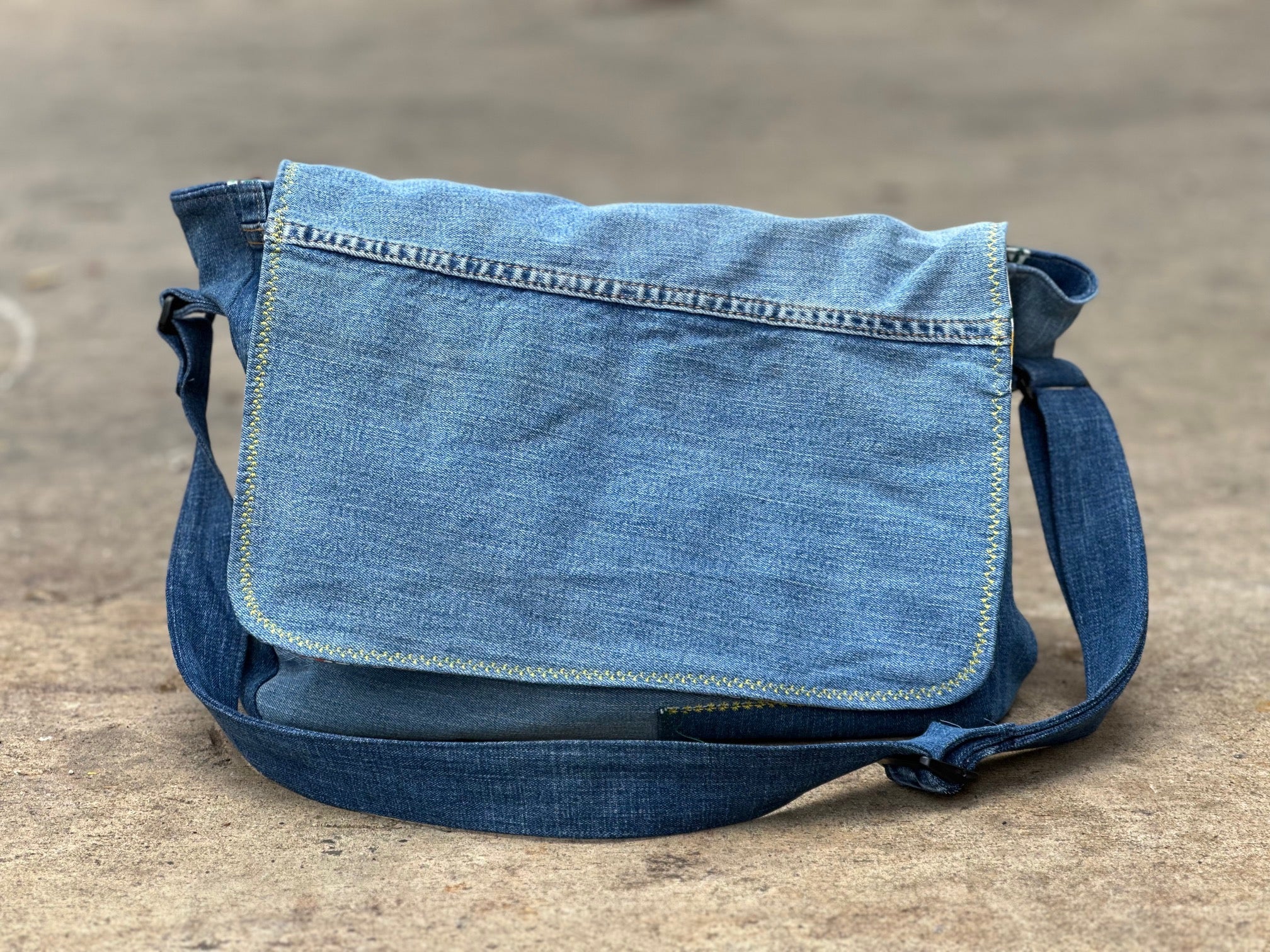 An Upcycled 555 Village Courier Bag