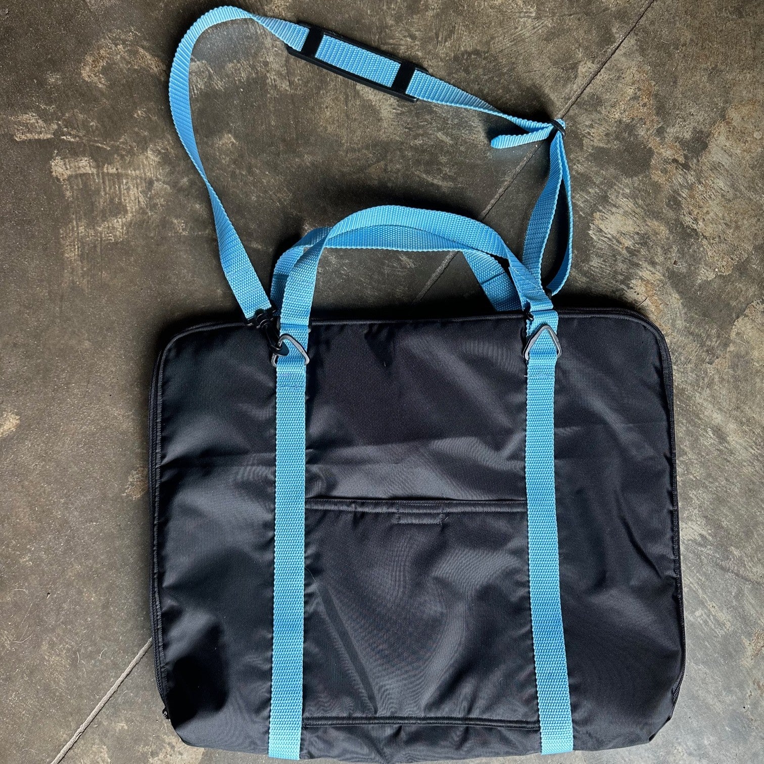 black briefcase with blue straps