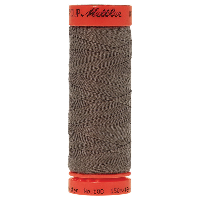 A spool of sewing thread wound on a red spool, with the brand name 'Mattler' visible on the top cap, set against a plain white background.