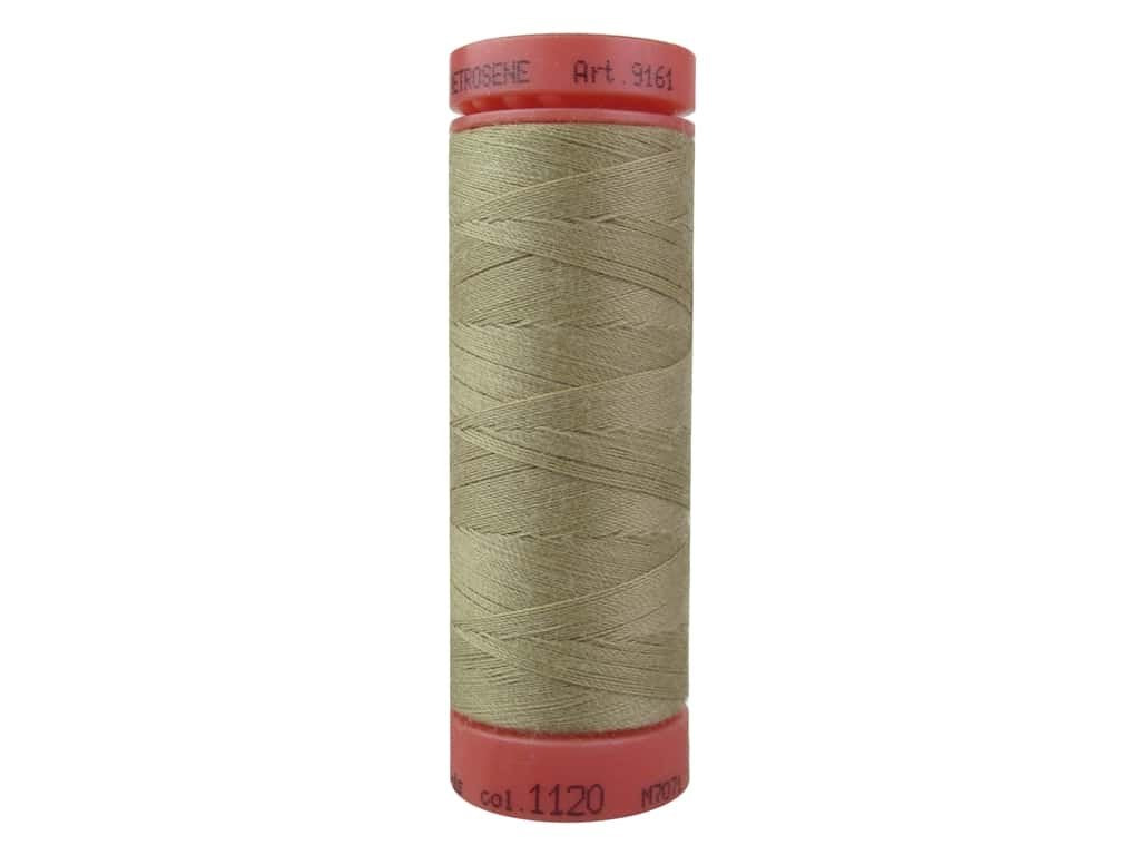 A spool of sewing thread wound on a coral-pink plastic core, with the brand name 'BROOKS BONE' and product code 'Art 9161' printed on the top cap. The thread itself is a muted, warm khaki-beige color.