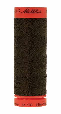 A spool of Mettler sewing thread in a very dark brown color, featuring a bright orange-red plastic top and bottom cap with black branding text, isolated on a white background.