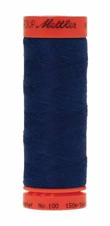 A spool of Mettler sewing thread in a deep royal blue color, with a bright orange-red top and bottom cone cap, shown against a plain white background.