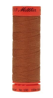A spool of brown sewing thread with a bright orange-red plastic core, shown against a plain white background.